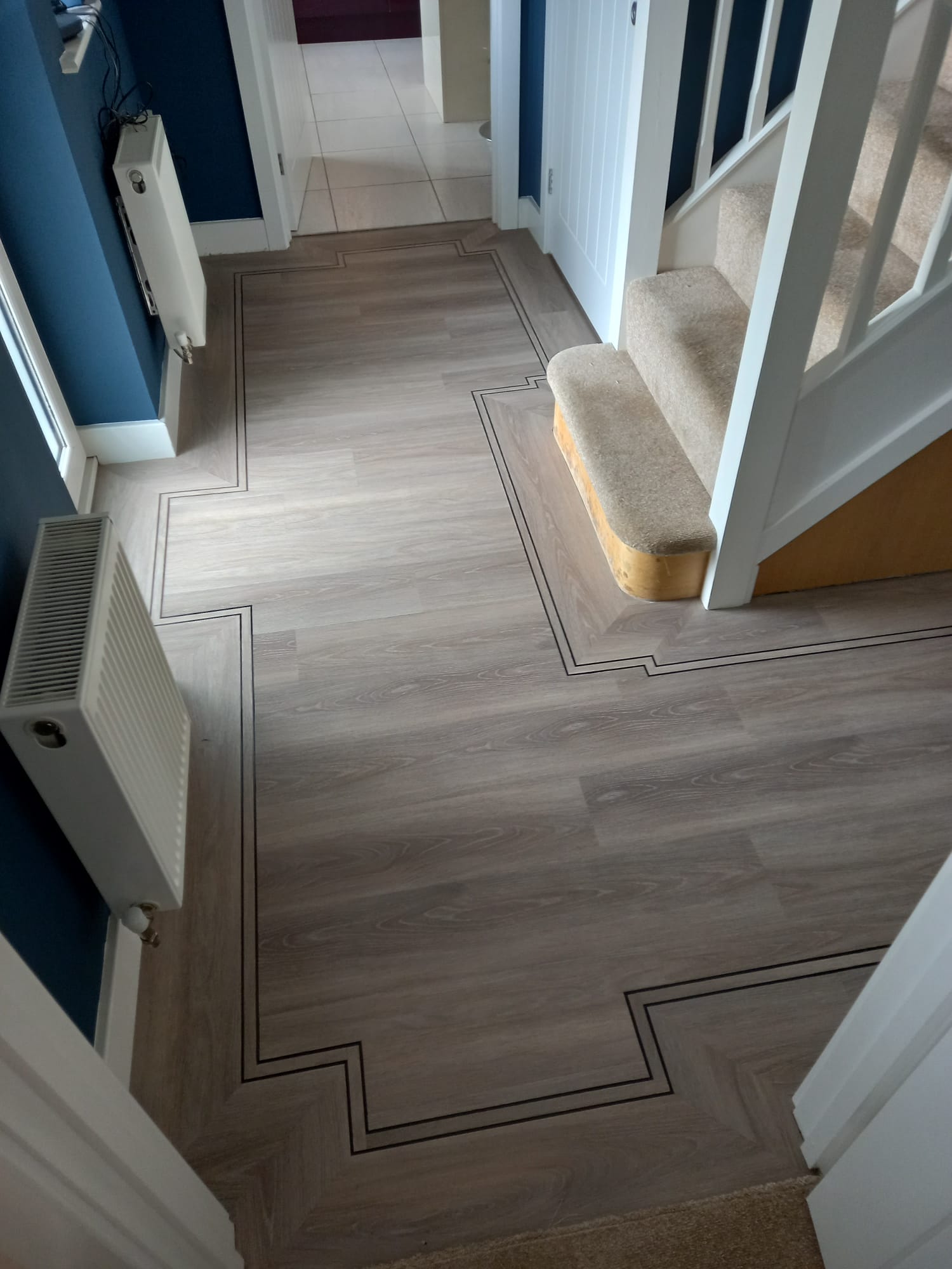 Karndean Knight Tile flooring with a feature strip border installed in Marlborough